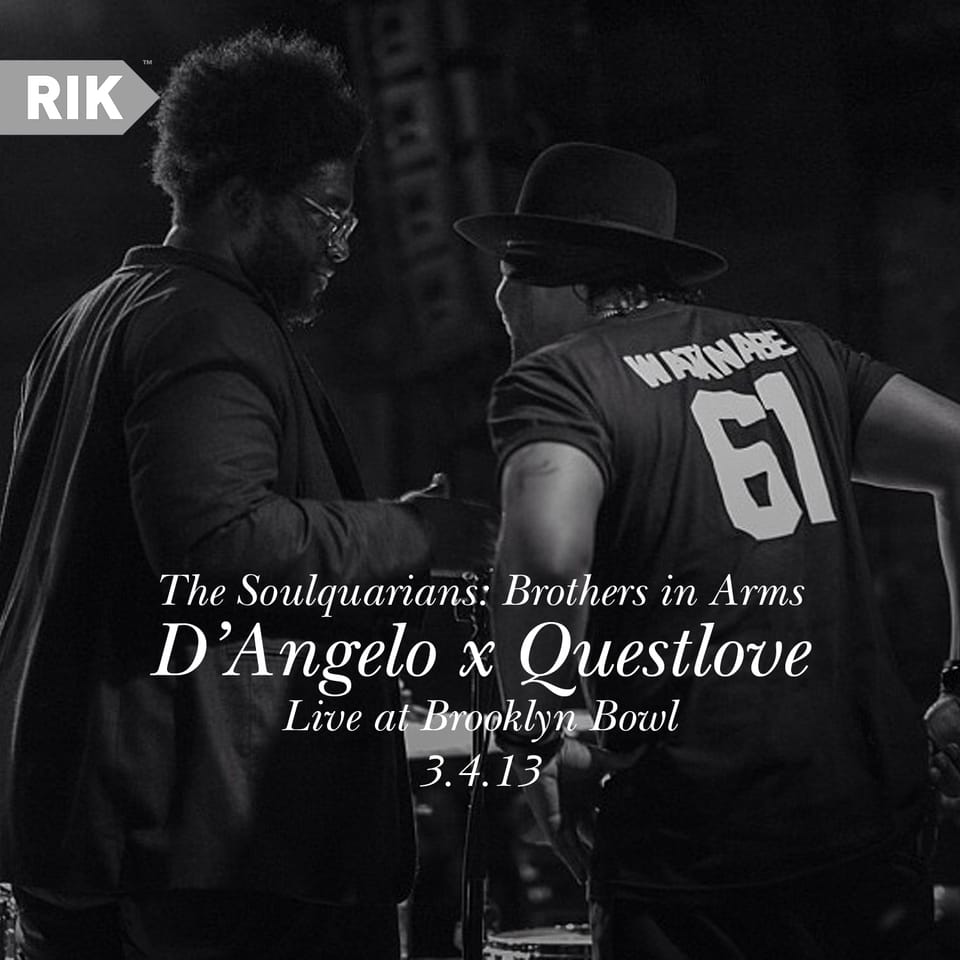 A black and white photo of Questlove and D'Angelo talking with each other on stage. The details for the show are in serif font over them, and the RIK logo is in the upper-right corner.