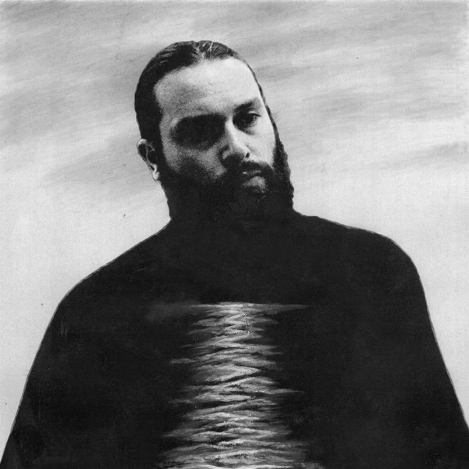 A mixed media (photography and painting) image of Nick Hakim in black and white, with a moonlit expanse of the ocean running vertically down his chest.
